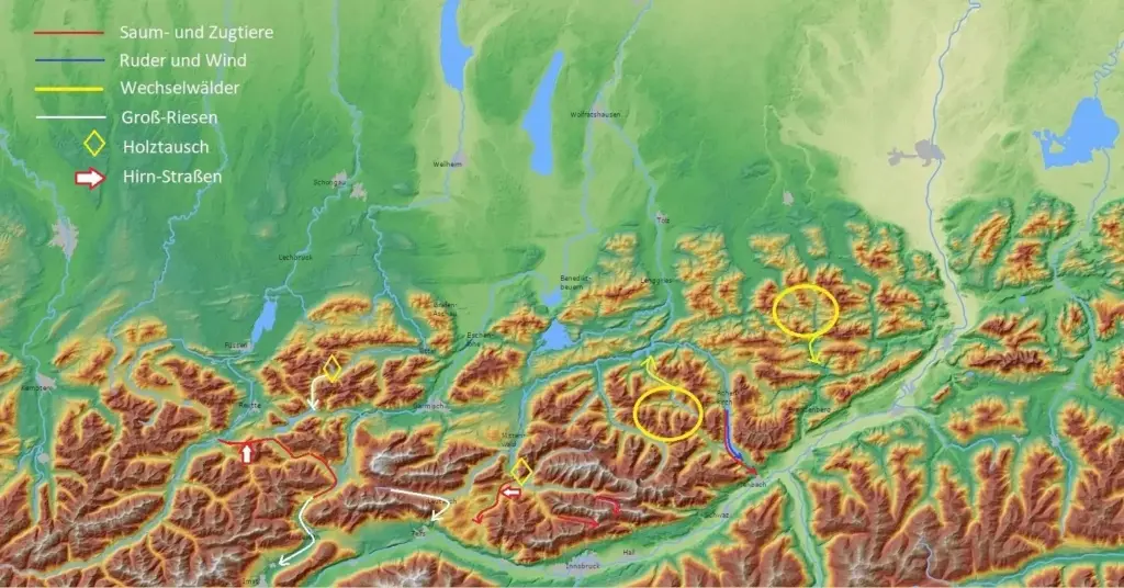 Eine topografische Karte der Alpen mit eingezeichneten Handelswegen, Straßen, Wäldern und gelb, rot und grün hervorgehobenen Gebieten; deutsche Beschriftungen kennzeichnen Wegetypen, Sehenswürdigkeiten und ursprüngliche Holzströme in der Region.