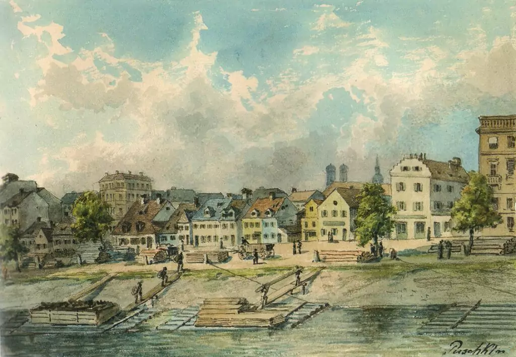 Eine Flussszene mit der Flößerei, mit Menschen, die in Ufernähe auf Holzflößen arbeiten, Häuserreihen und einigen Bäumen unter einem teilweise bewölkten Himmel.