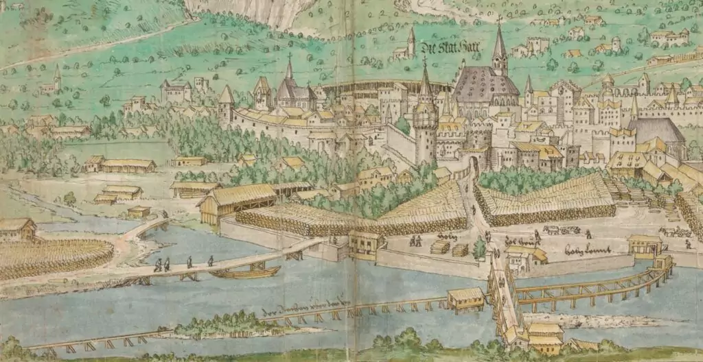 Illustriertes mittelalterliches Stadtbild mit einer ummauerten Stadt, mehreren Brücken über einen Fluss, Booten, Feldern und der umgebenden Landschaft.